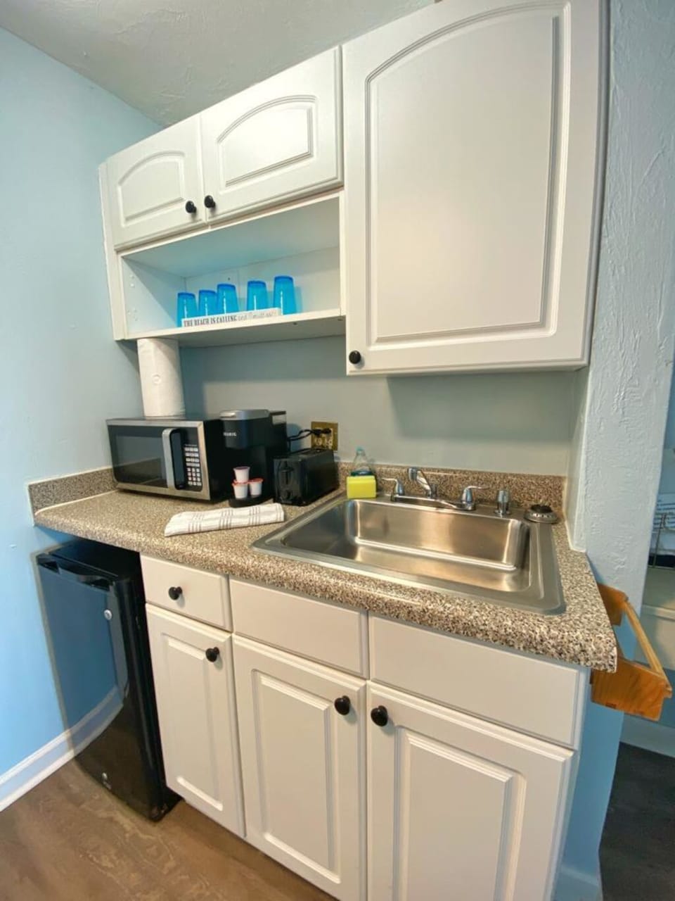 Newly furnished kitchen with microwave and refrigerator!