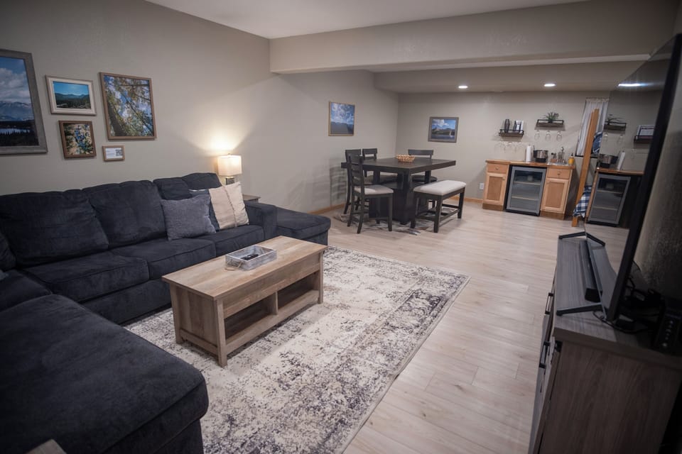 Our downstairs living room features a twin bunk bed and a pull-out sofa bed. 