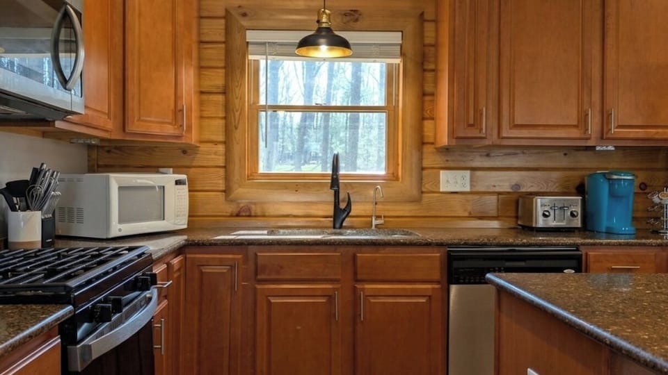 Fully stocked kitchen with stainless appliances & all essentials for your stay.