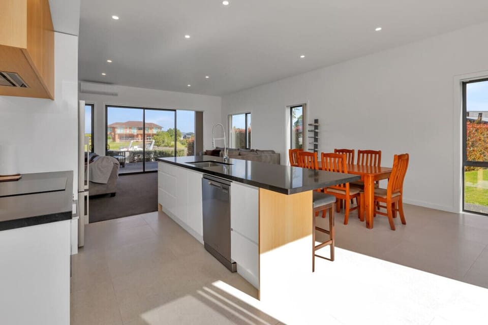 Open plan kitchen, dining and lounge areas