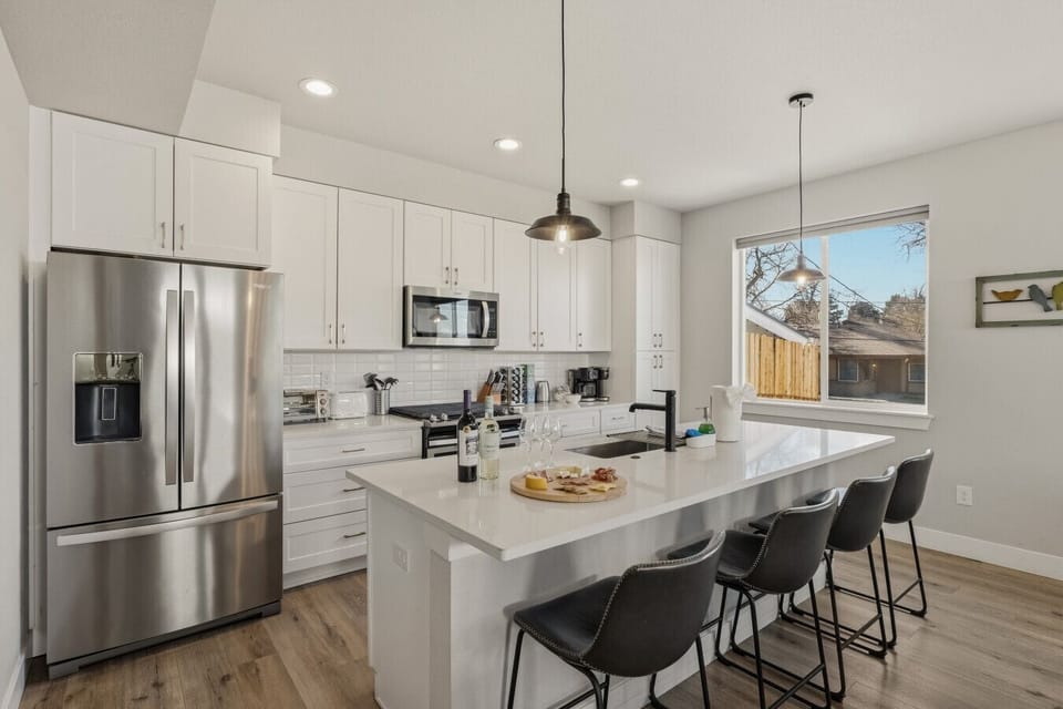 Stainless steel appliances, and tons of countertop space makes this a perfect chef`s kitchen