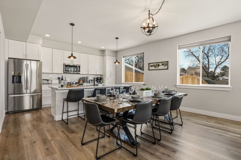 Dining table with seating for 8, and 4 more at the island