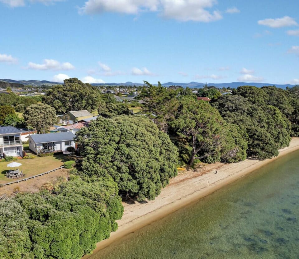 Direct beachfront access: Studio 5 is positioned just steps away from the sand in a quiet coastal community.