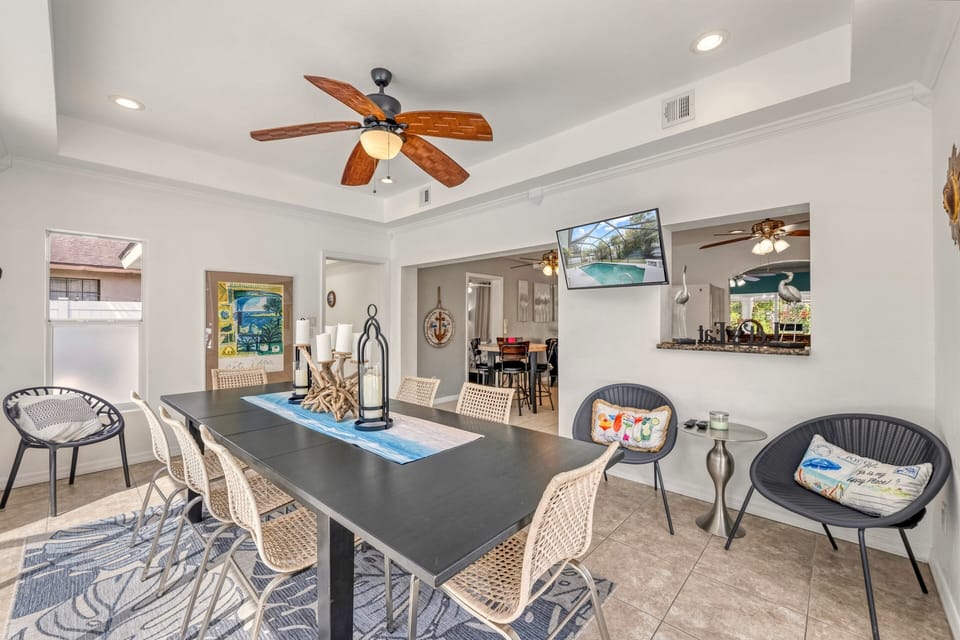 Gather around the large dining table with seating for family meals and game nights.