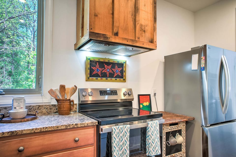 Kitchen is outfitted with an Electric Range