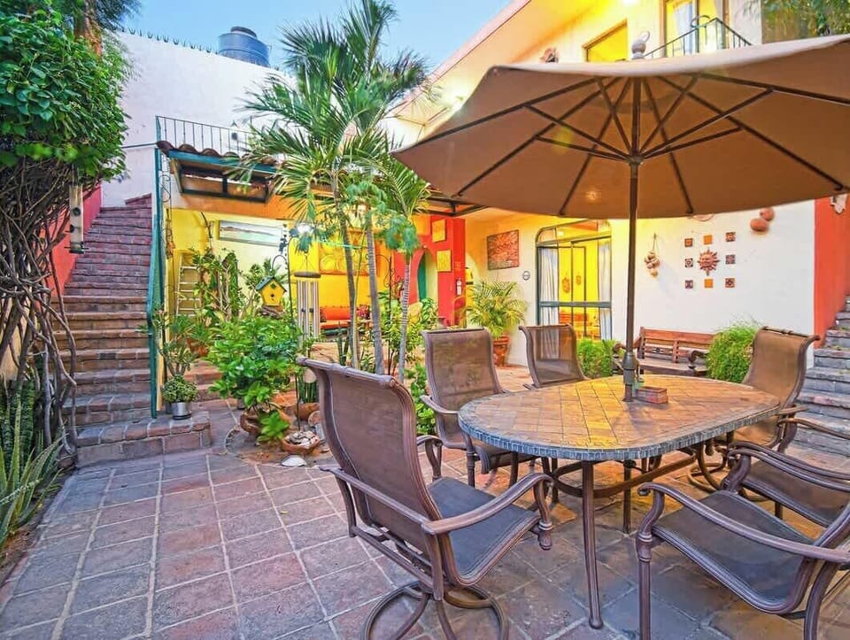 Here you can enjoy a meal or just hang out at the table shaded by a large umbrella