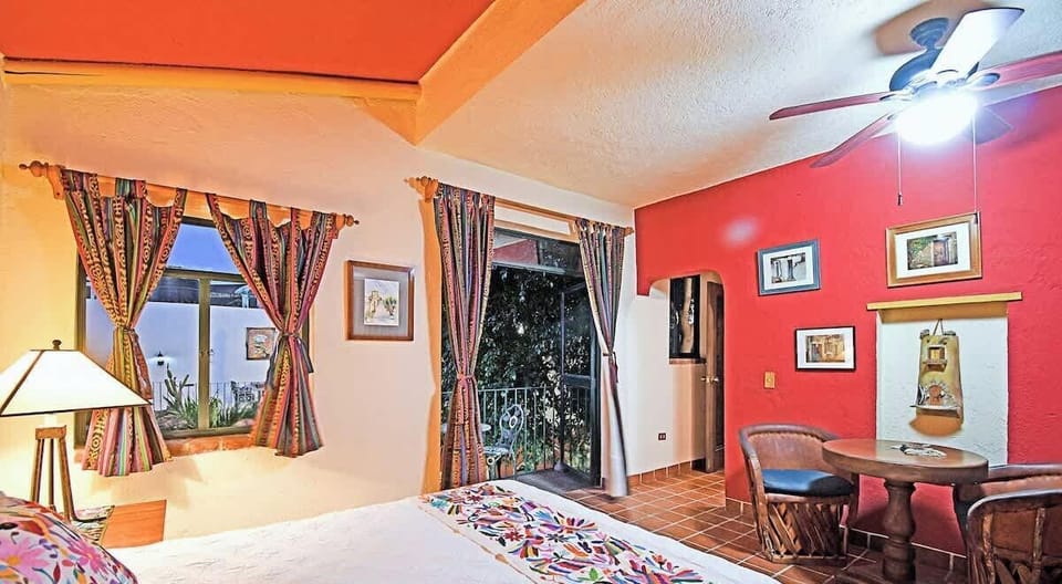 Stay cool and comfortable with A/C, a ceiling fan, and room-darkening curtains.