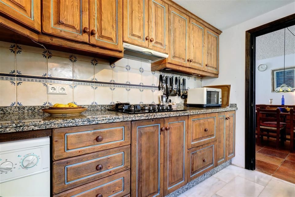 Another picture of the spacious kitchen in this property