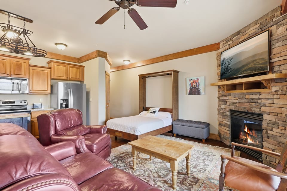 Open floor plan connects the living room to the fully equipped kitchen