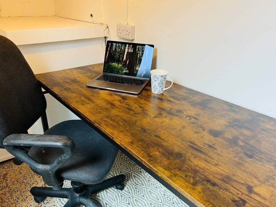Workspace area for those who need to check in whilst on holiday.