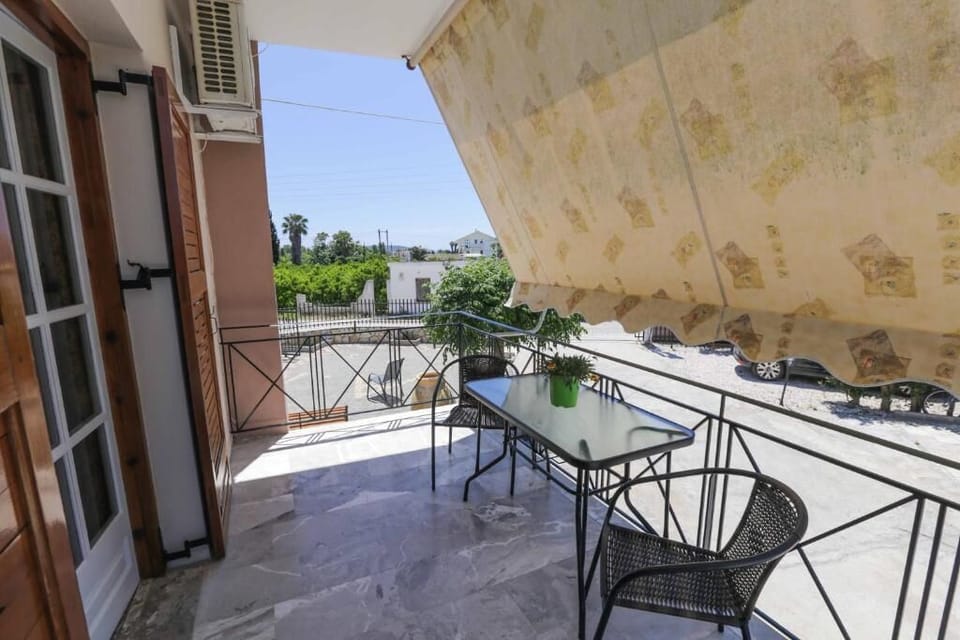 Shaded terrace outside the apartment — a great place to unwind.