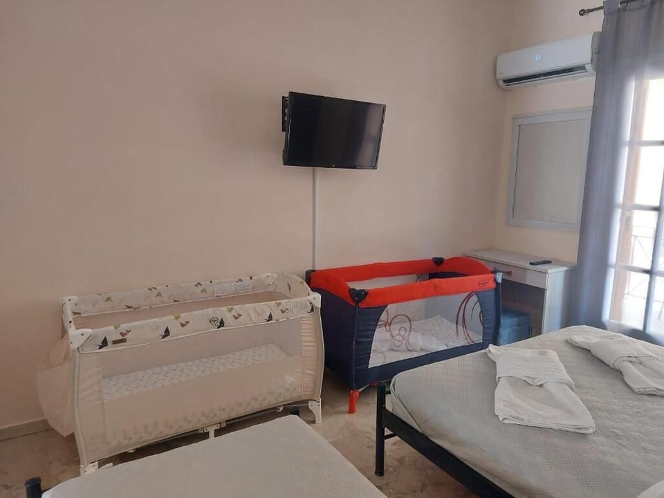 Cots available for our little guests-upon request