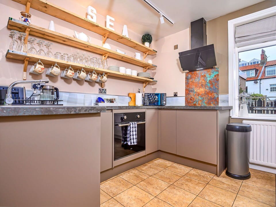 Kitchen, Major Appliance, Kitchen Appliance, Interior Design, Flooring, Countertop, Cabinetry, Room, Home Appliance, Furniture