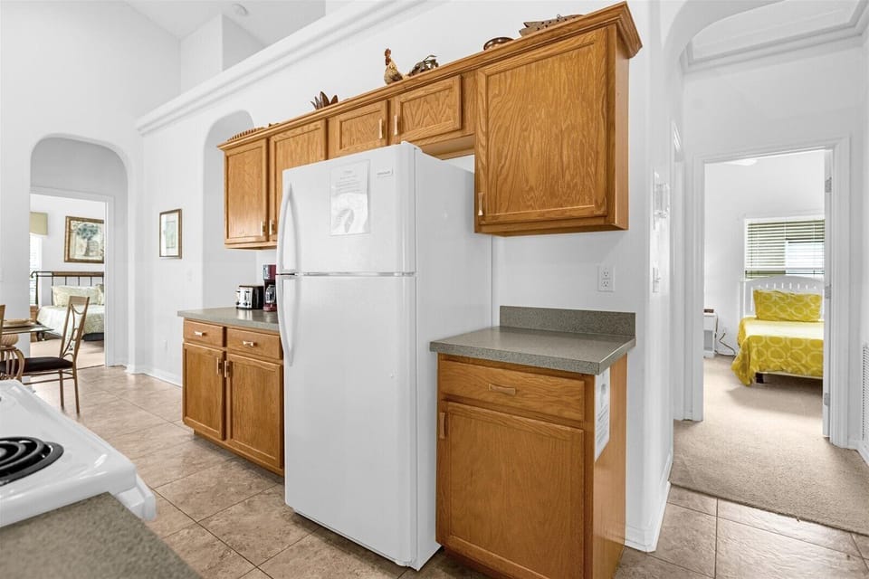 Kitchen with Fridge, Toaster and Coffee Maker