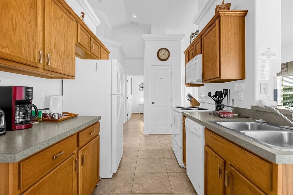 Kitchen with Fridge, Stove, Dishwasher, Microwave, Coffee Maker