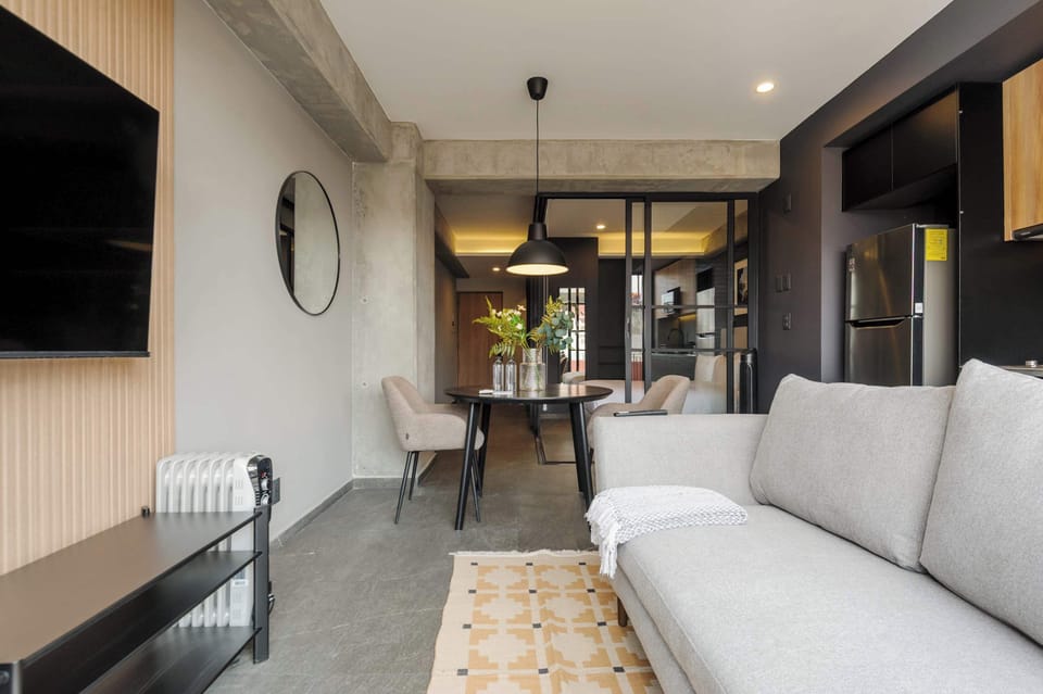 Open-concept layout connecting living, dining, and kitchen spaces seamlessly.