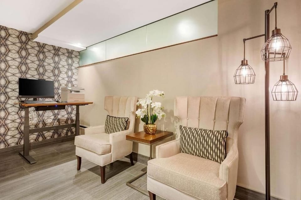 Settle into a quiet corner with cozy chairs and calm.