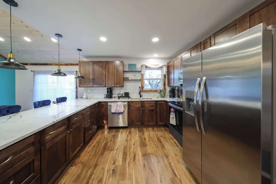 Welcome to a spacious kitchen designed for making large meals for any occasion! It includes all the basics plus a full spice rack and well stocked coffee station!