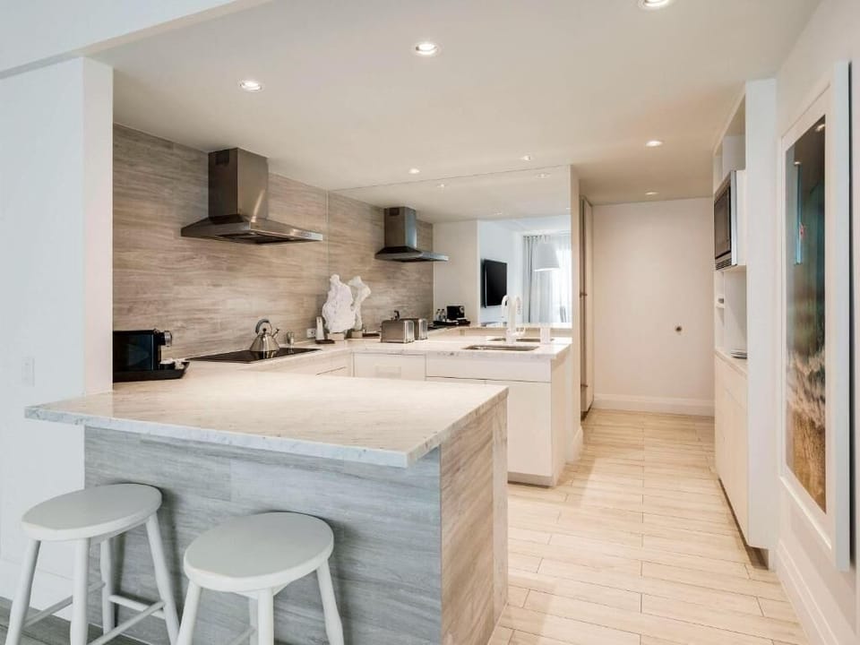 Cook with ease in the open kitchen with generous prep space.