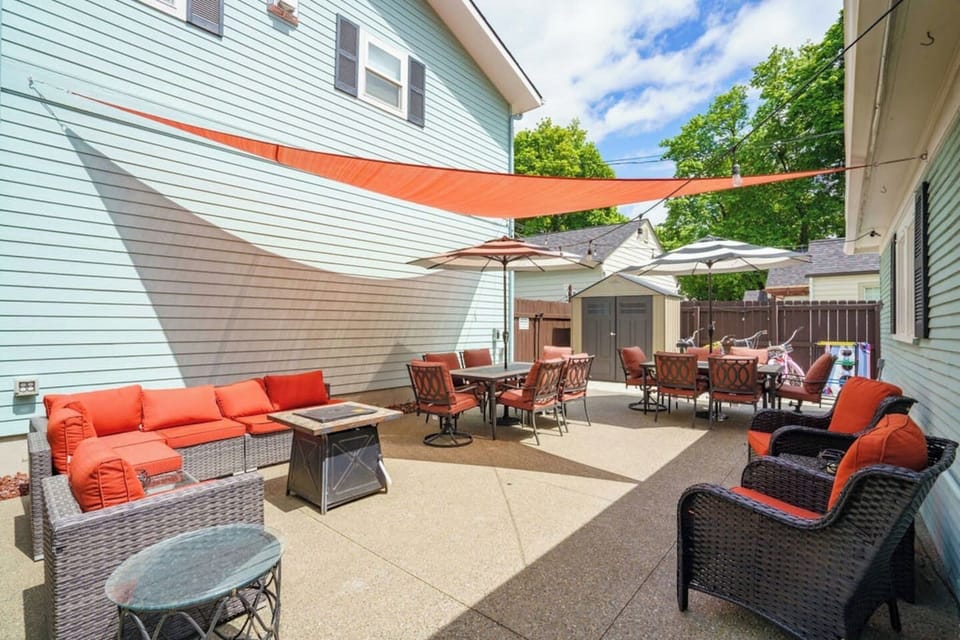 Relax and dine on your spacious back patio with seating for 12! Featuring a comfortable outdoor sofa, lounge chairs and a sun shade, it’s just steps away from the hot tub.