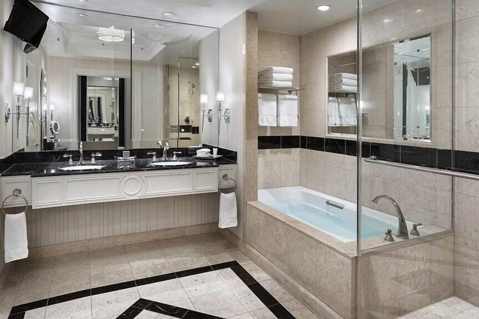 Indulge in spa-like comfort with bright vanity lighting.