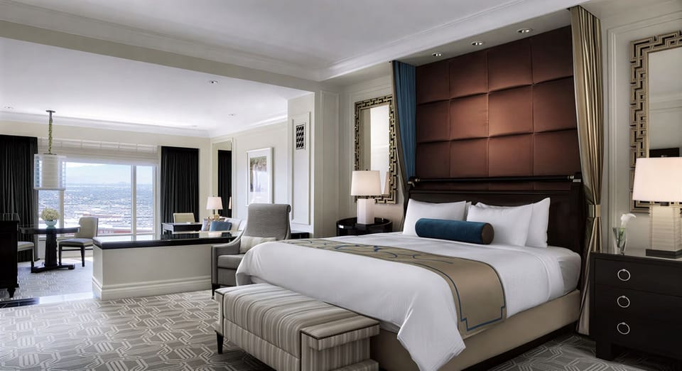 Wake up to skyline views from a plush king bed.