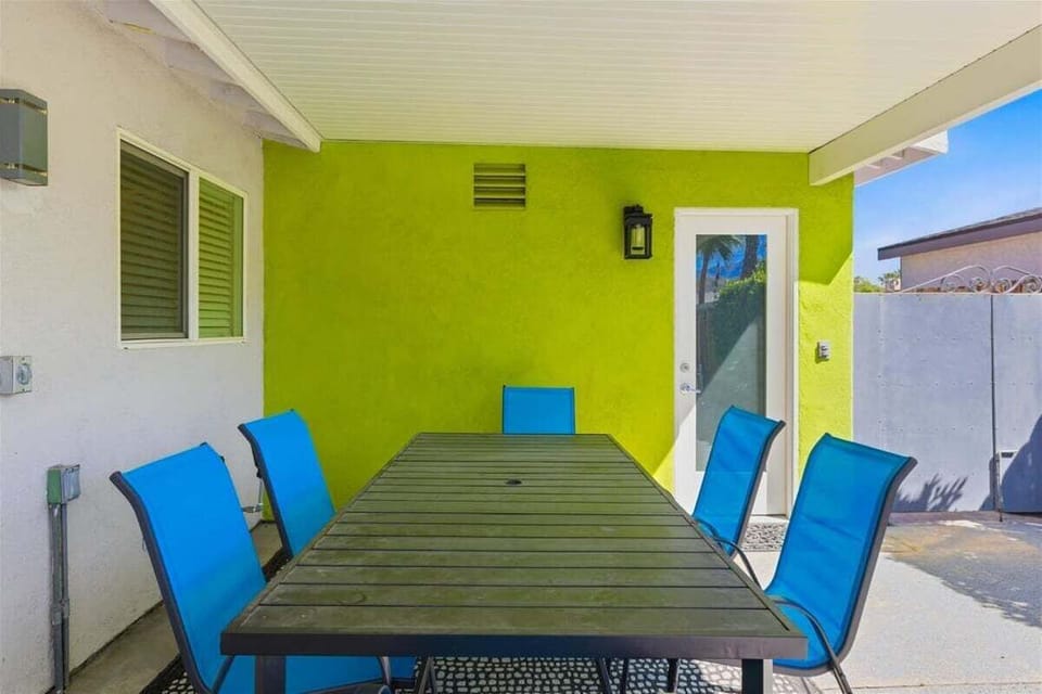 Covered patio dining area perfect for outdoor meals