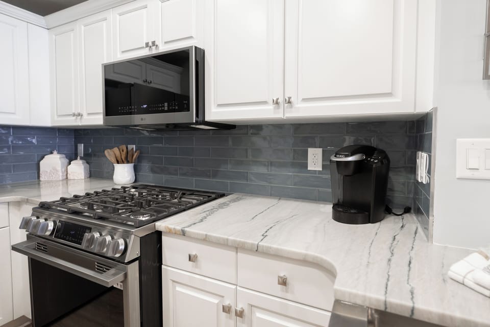 Brand new gas stove and microwave.