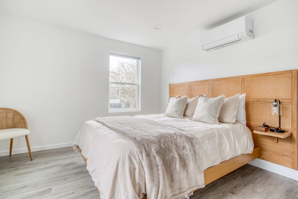 Bedroom Retreat: Relax in style with plush bedding and chic decor in this serene getaway!