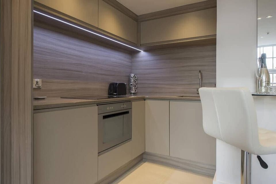 The kitchen is fully equipped with everything you need to cook a meal. 