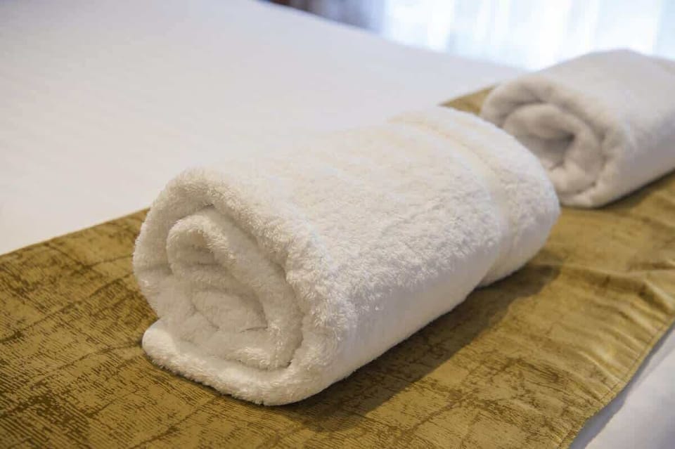 Hotel standard, fluffy, white towels are provided for all guests