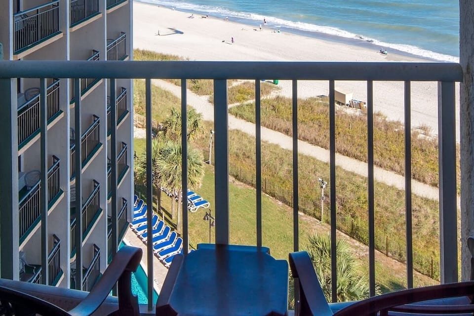 Sip morning coffee while watching waves roll in below.