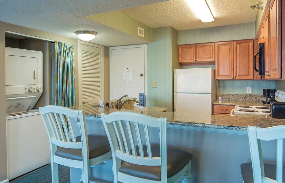 Cook and wash beachwear easily with full kitchen and laundry.