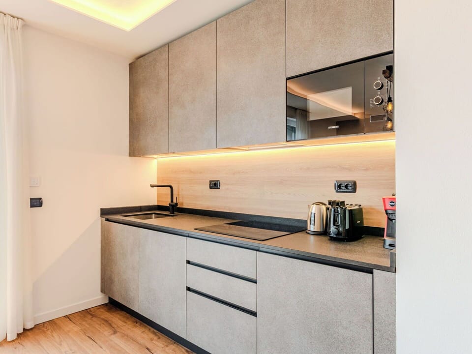 Kitchen, Countertop, Wood, Cabinetry, Interior Design, Kitchen Appliance, Flooring, Home Appliance, Furniture, Major Appliance