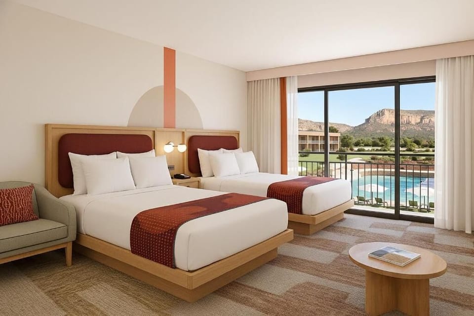 Stretch out on plush beds with a balcony view.