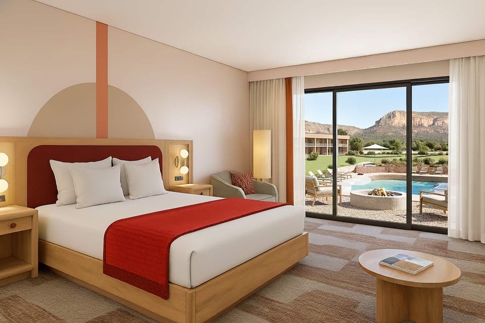Wake up to sunlit comfort and sweeping poolside views.