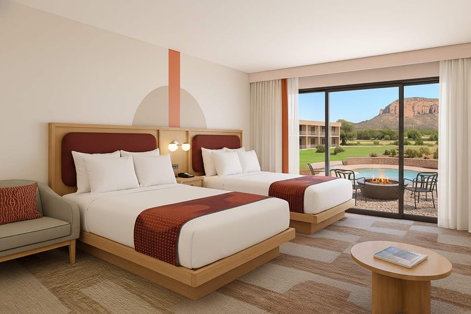 Wake up to sweeping mountain views from plush double queens.