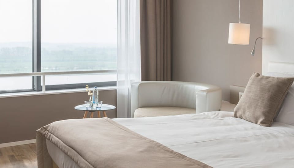 Linger by the window with coffee and calming horizon views.