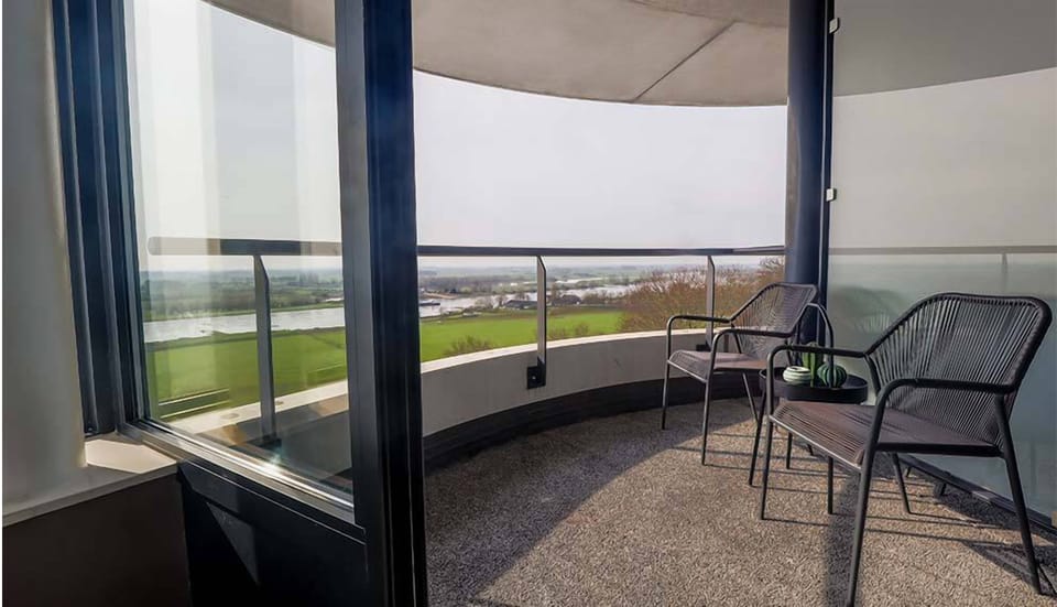 Sip morning coffee while soaking up sweeping countryside views.