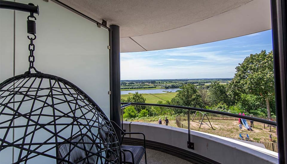 Unwind in the hanging chair with panoramic lake views.
