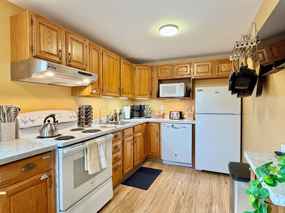 Cook up your favorite meals in the fully equipped kitchen, complete with everything you need for a cozy, stress-free stay.