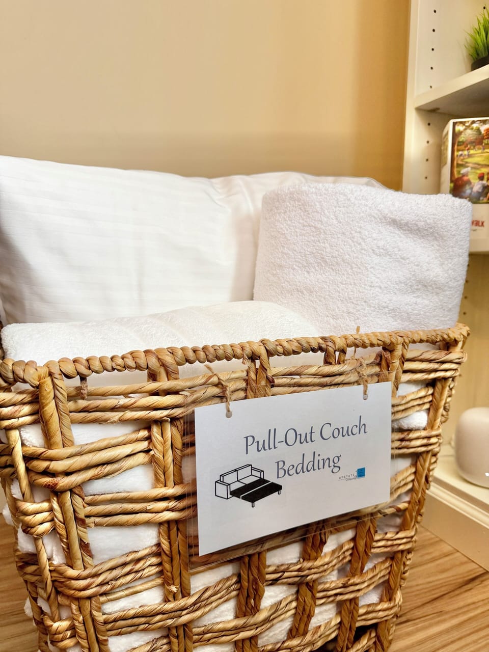 The pull-out couch comes with fresh bedding, so extra guests can sleep comfortably without a worry.