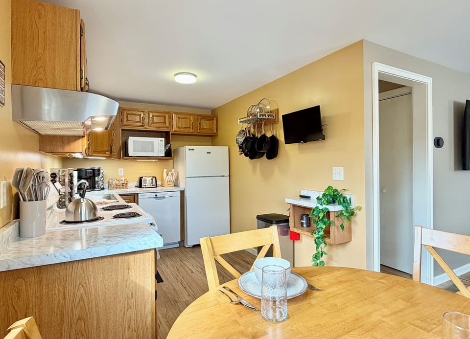 Everything you need at your fingertips! The kitchen includes a fridge and microwave for quick meals, snacks, and easy meal prep during your stay.
