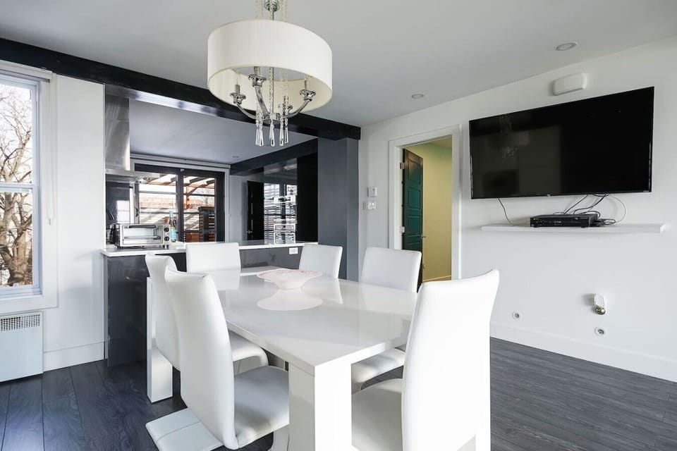 Spacious table for dining, working, or gathering.
