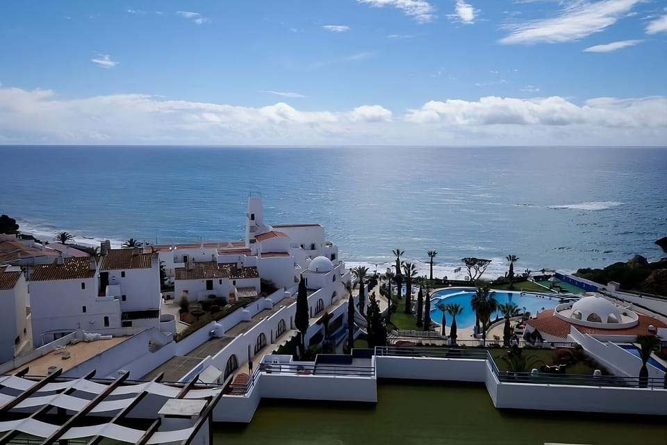 Picture yourself poolside at a stunning oceanview resort.