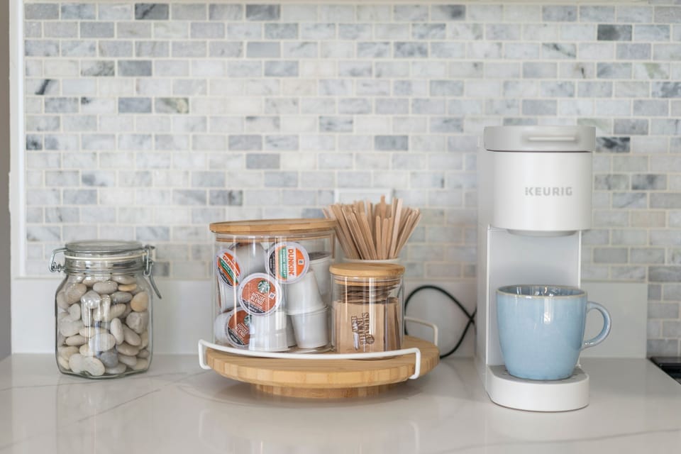 Fully equipped kitchen with modern appliances, Keurig and island seating for 3.