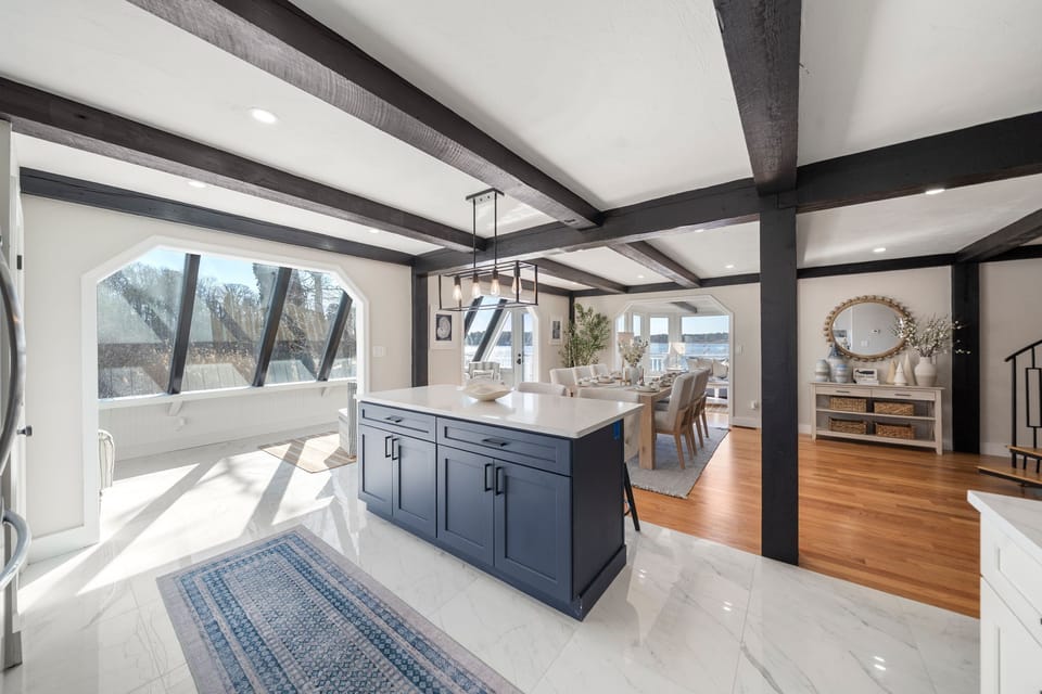 Fully equipped kitchen with modern appliances, Keurig and island seating for 3.
