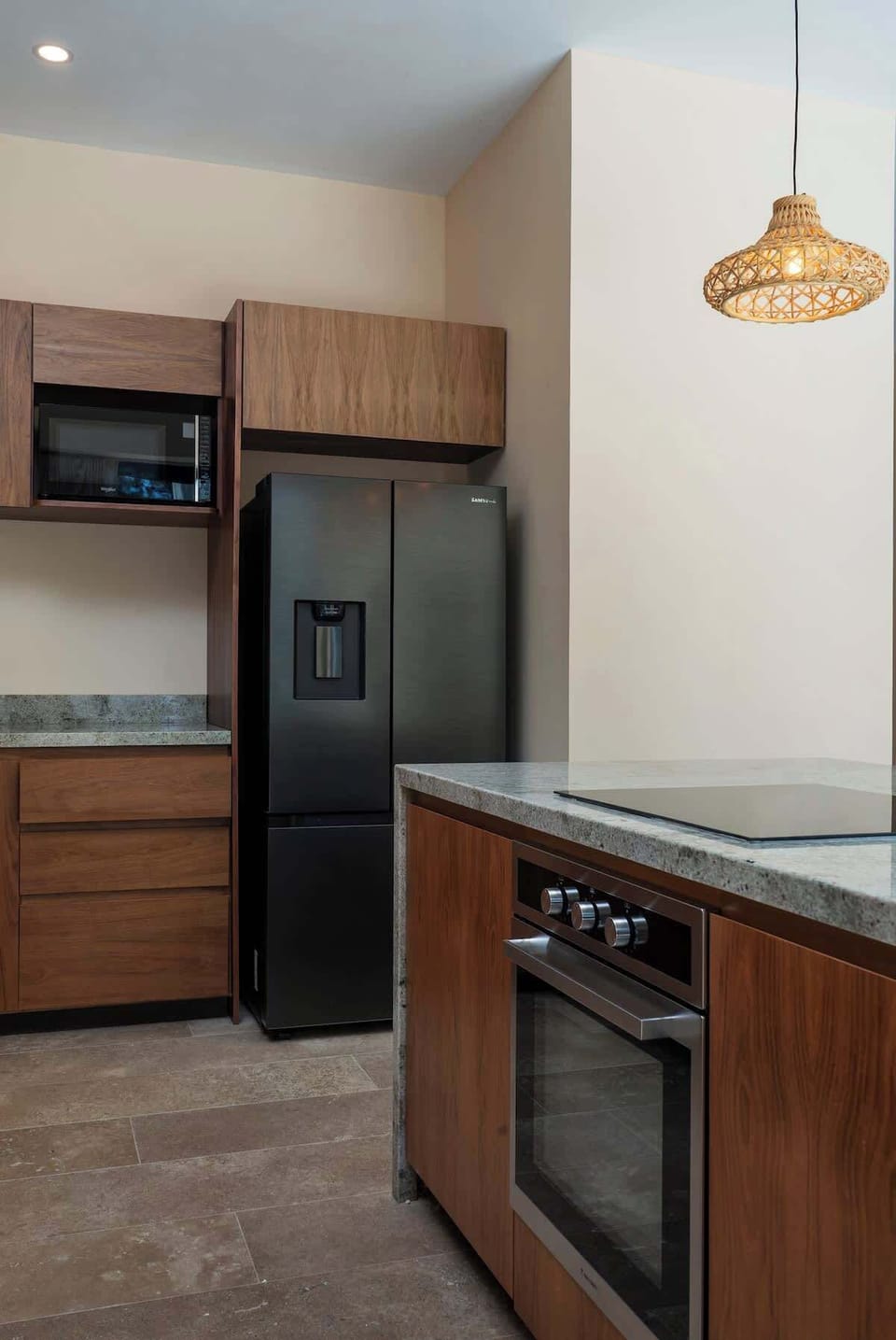 Modern and beautiful fully-equipped kitchen. The island has an oven.