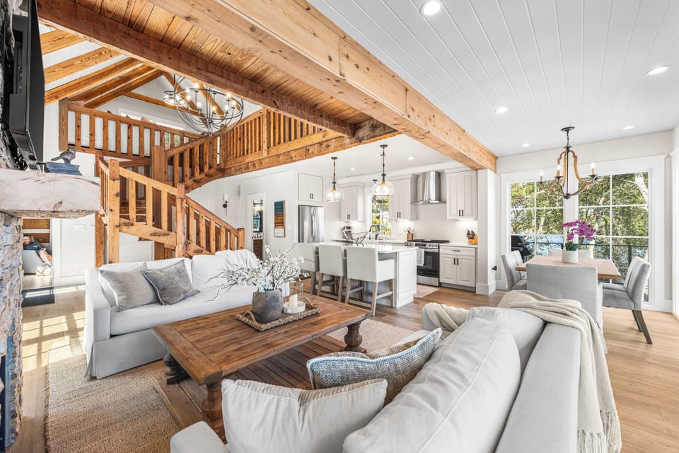 Relax on the comfortable sofas in this airy living area