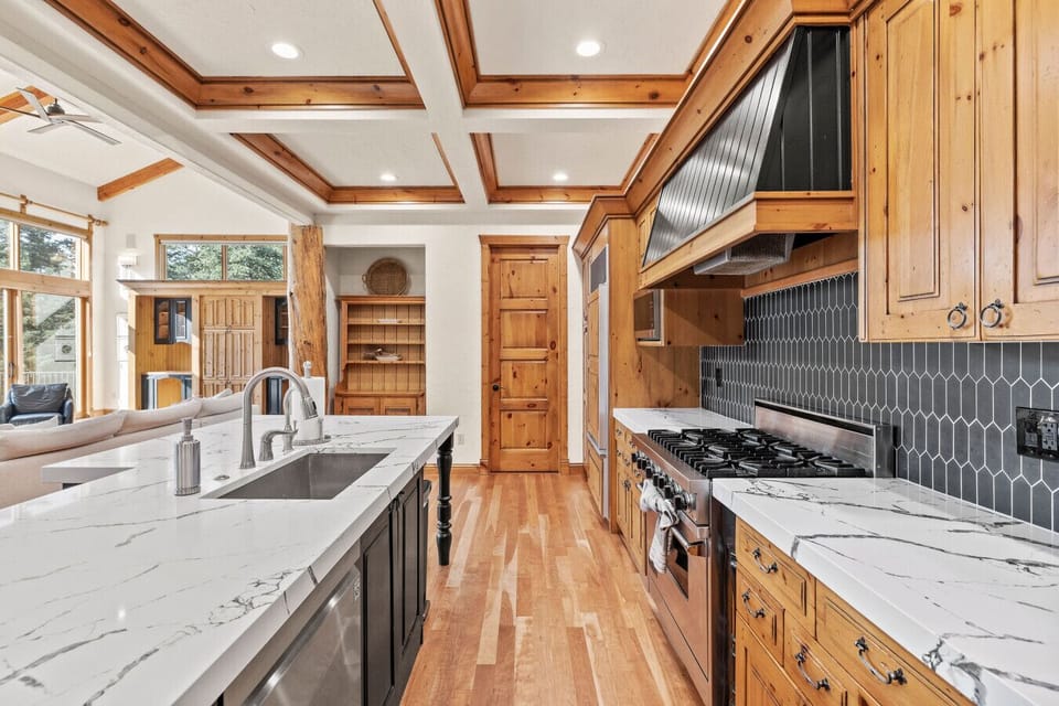 Spacious kitchen with modern appliances and ample counter space.